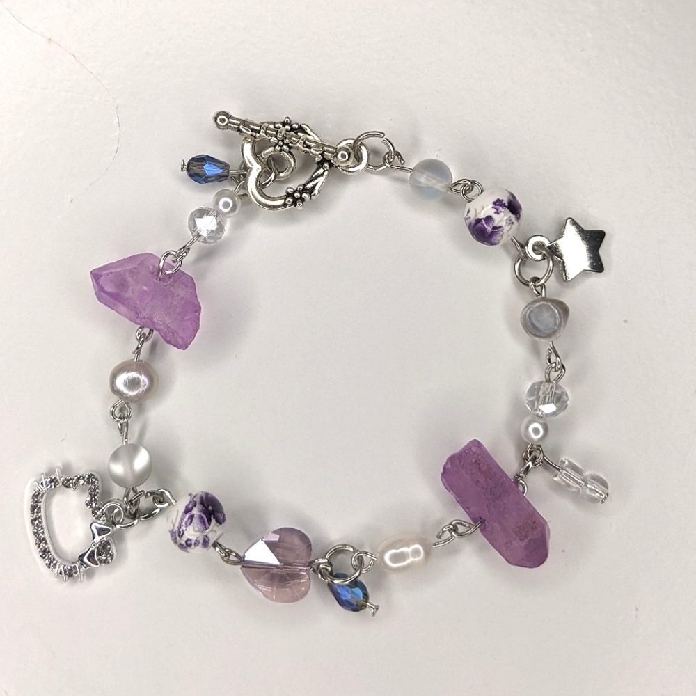 Bracelet with pearl beads crystal beads and a toggle clasp. Handmade by me.